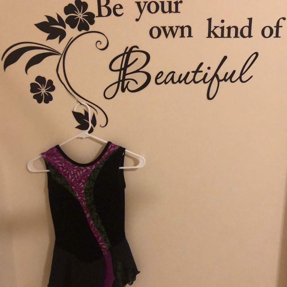 Jerry’s purple and green figure skating dress